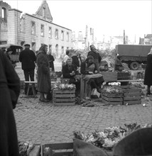 Flower sellers are waiting for customers