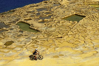Mountain biking near Gozo salt pans