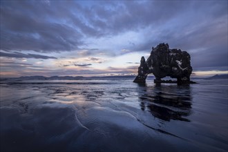 Cloudy atmosphere with reflection at Hvitserkur