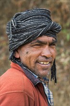 Nepalese man wearing a scarf