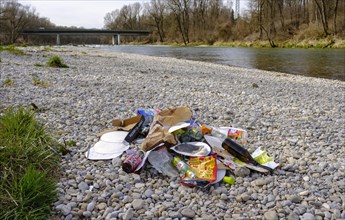 Lost garbage on gravel bank