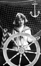 Woman at the steering wheel
