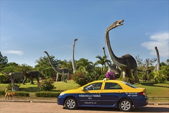 Cab in front of Dinosaur Park