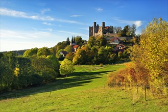 Ruin of Hanstein Castle above the village of Rimbach in autumn