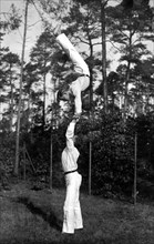 Handstand on the hands of another