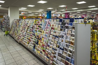 Shelf with greeting cards at a supermarket
