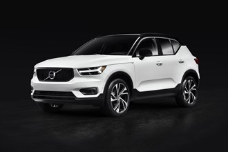 White 2019 Volvo XC40 T5 AWD R-Design Luxury car SUV isolated on black studio background with clipping path