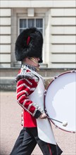 Guardsman of the royal guard with bearskin cap and drum