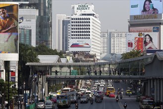 Busy road with pedestrian bridge