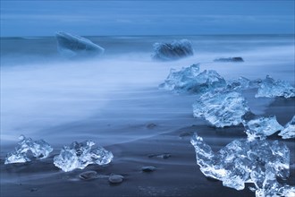 Pieces of ice on the beach