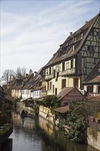 Half-timbered houses on the banks of the small river Lauch in the old town