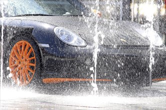 Porsche in a rain simulator