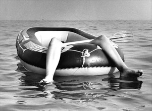 Two legs in rubber dinghy