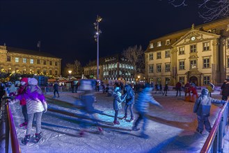 Skating rink in front of the Palais Stutterheim for the evening Christmas season