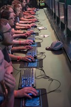 Visitors play computer games