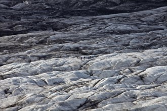 People on the glacier tongue of Svinafellsjokull in Vatnajokull National Park