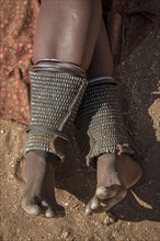 Leg ornamentation and at the same time protection against snake bites in the people of Ovahimba or Himba