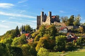 Ruin of Hanstein Castle above the village of Rimbach in autumn