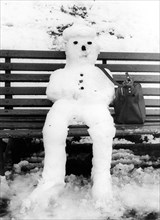 Snowman nit bag sits on bench ca. 1970s