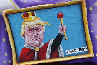 US President Donald Trump as king with scepter in a picture frame