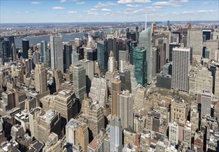 View of skycrapers around Times Square and Midtown Manhattan from Empire State Building