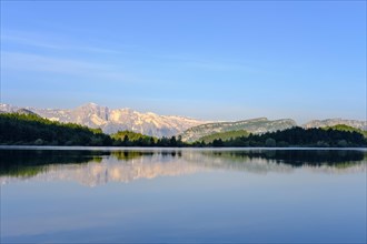 Nemercka Mountains is reflected in the lake