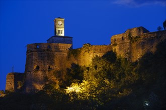 Clock tower on the castle at night