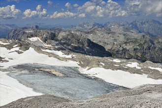 View from the summit of the Hochkonig to the plateau of the Ubergossene Alm