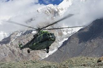Helicopter landing at the Khan Tengri Base Camp