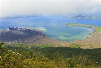 Ascent to Mount Kobui with view into the crater of the volcano Tavurvur