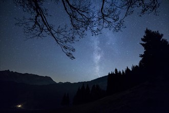Milky Way over the mountains and forest at Schwagalp