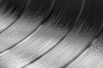 Close-up of a black retro record surface