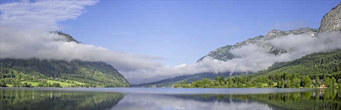 Panoramic view over the Grundlsee with low clouds