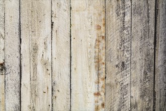 Close-up of old wooden grey and white painted barn wood planks