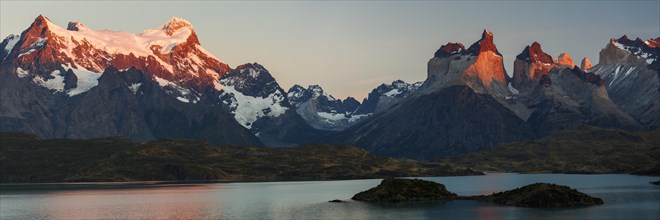 Mountain massif Cuernos del Paine illuminated by the morning sun