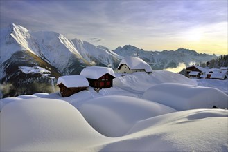 Deep snow-covered mountain village