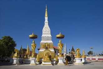 Chedi of Wat Mahathat Temple with Wheel of Life and golden Buddha figures