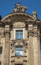 Caryatids and Kouroi at the window of Palais Lenbach