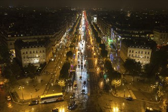 View from above onto Champs-Elysees by night