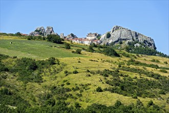 View of mountain village on rock Morg Caraceni