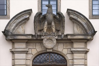 Former main entrance at the old building of the district court with Recihsadler and swastika removed in 1945