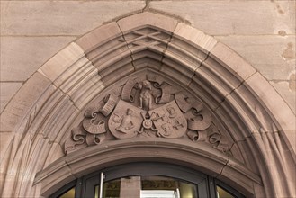 Sandstone relief over an entrance portal