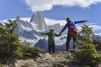 Woman with child hiking at Cerro Fitz Roy