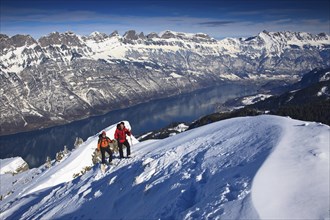 Two mountaineers on a ski tour in winter