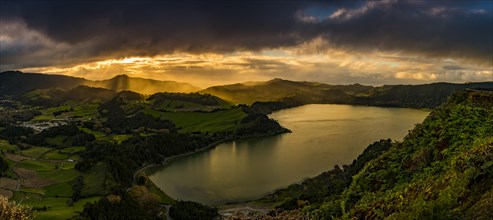 Furnassee with hilly landscape and dramatic atmospheric lighting