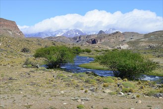 River with mountain panorama in the Meseta del Lago Buenos Aires