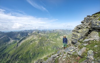 Hiker on the hiking trail to Hochgolling