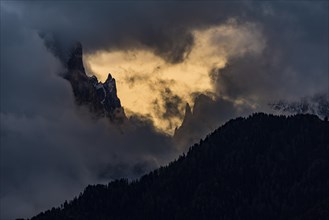 Mountain peaks with dramatic clouds