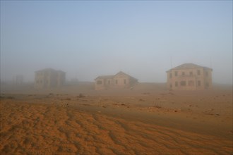Old houses in the sea mist of the former diamond city