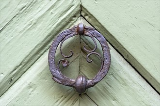 Medieval door knocker at the former